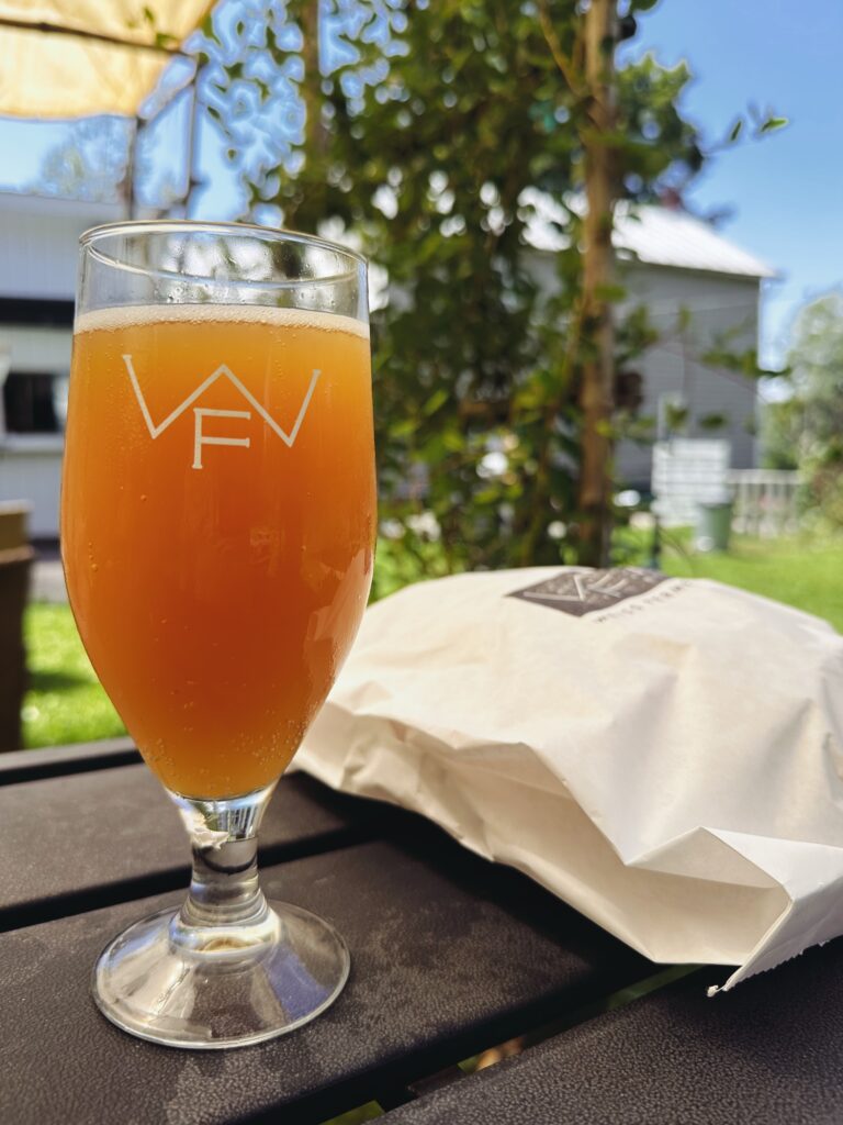 What we came for. A tall glass of golden beer and a bag containing some of the best bread I've ever tasted.